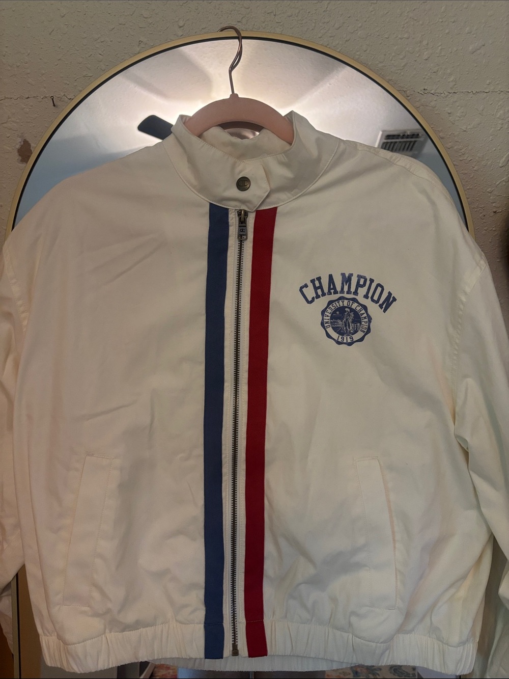 Champion Men's Cream Windbreaker with Blue & Red Stripe Detail